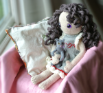 pixie's favorite knitted heidi doll dress and cat from knit and purl pets by claire garland